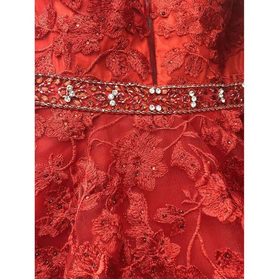 Red embroidered tulle ball gown bodice with jeweled waist detail