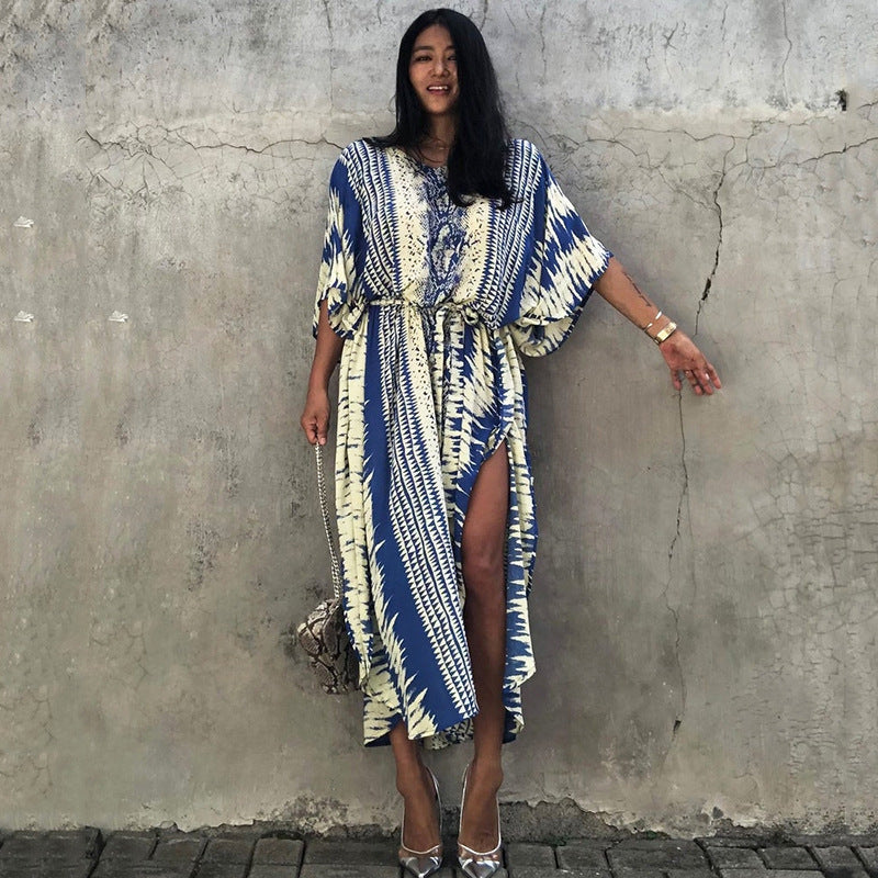 Women’s rayon robe dress in blue and cream snake pattern with tie waist and side slit