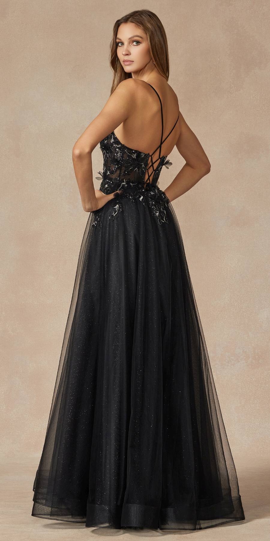 Black tulle A-line gown with thin straps and sparkling bodice, open back view