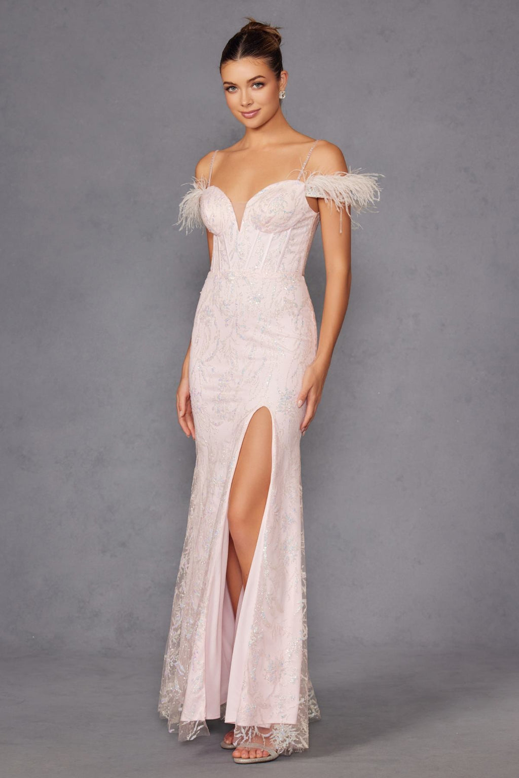 Off-white long sequin gown with feathered off-shoulder sleeves and high front slit