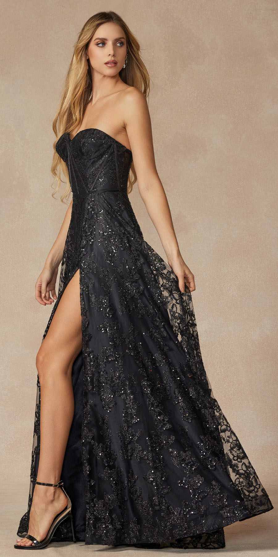 Black strapless long gown with corset bodice, glitter embroidery, and side slit