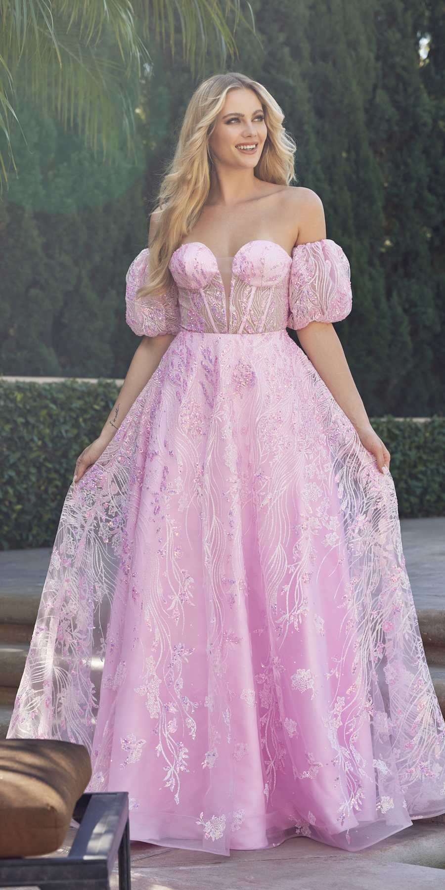 Light pink strapless sequin tulle ballgown with puff sleeves and full A-line skirt