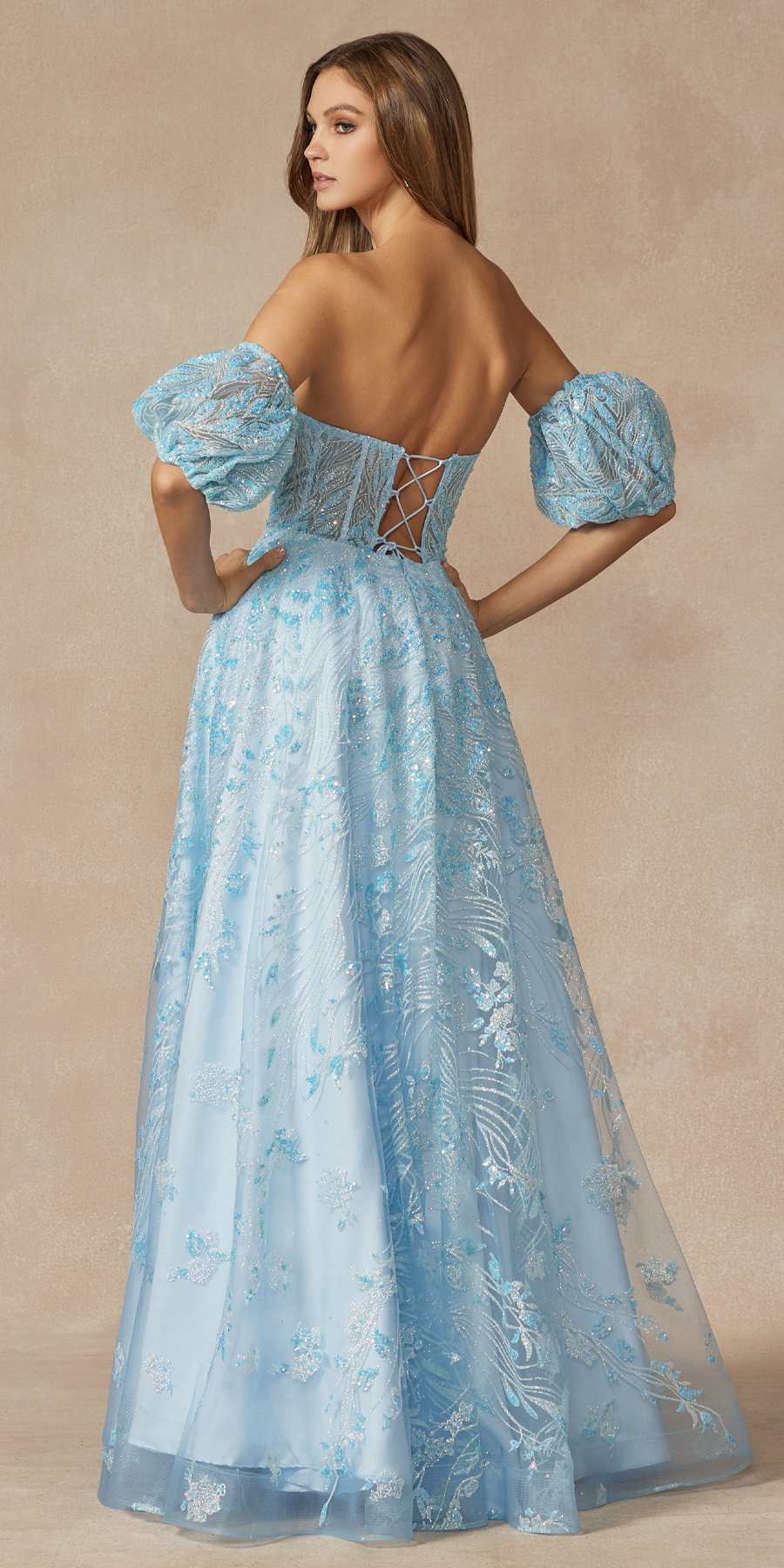 Sky blue strapless sequin tulle ballgown with puff sleeves and crisscross open back