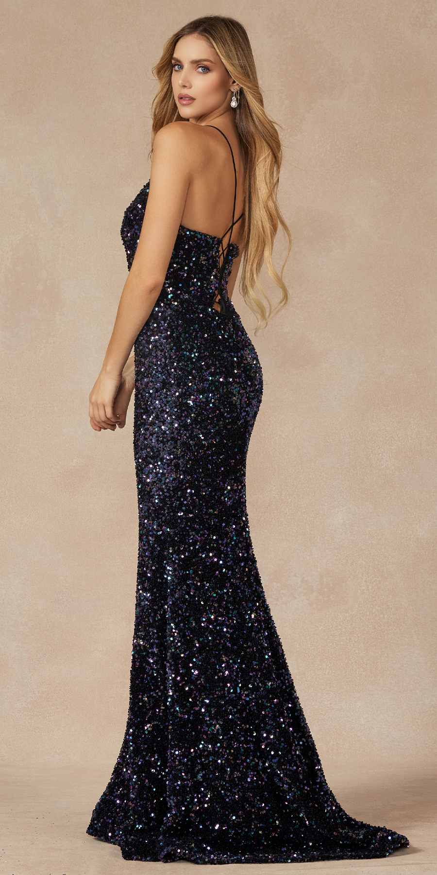 Fitted velvet sequin gown with lace-up back and spaghetti straps, side view