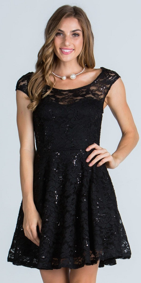 Black lace short dress with cap sleeves, scoop neck, and pearl necklace detail