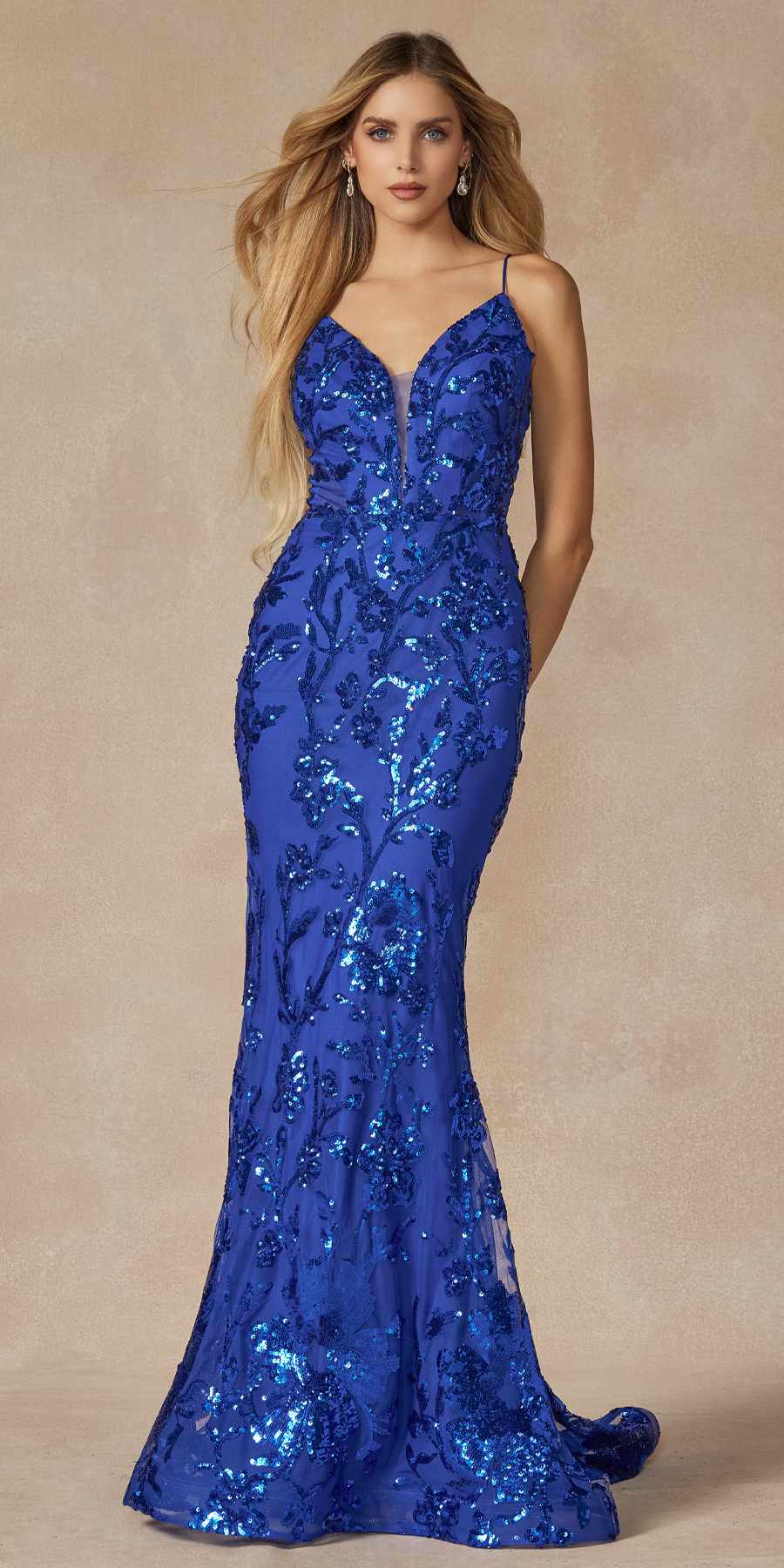 Royal blue sequin fitted prom gown with V-neck bodice and tapered mermaid skirt
