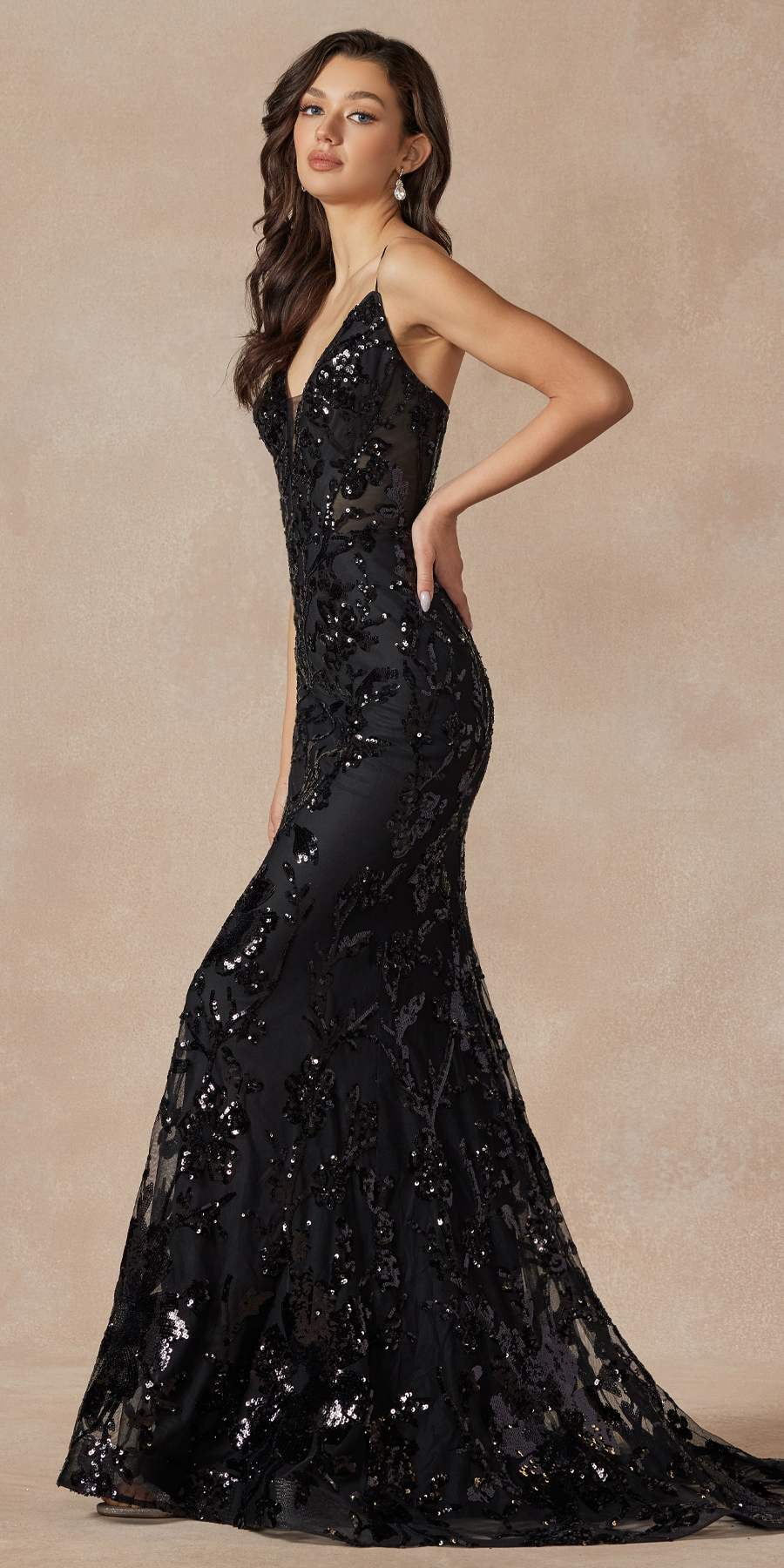 Black fitted prom gown with deep V halter straps and sparkly sequin lace texture