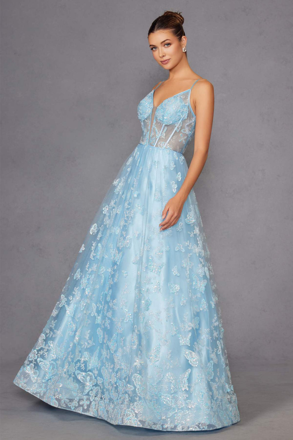 Ice blue long A-line gown with corset top, thin straps, glitter embroidered skirt