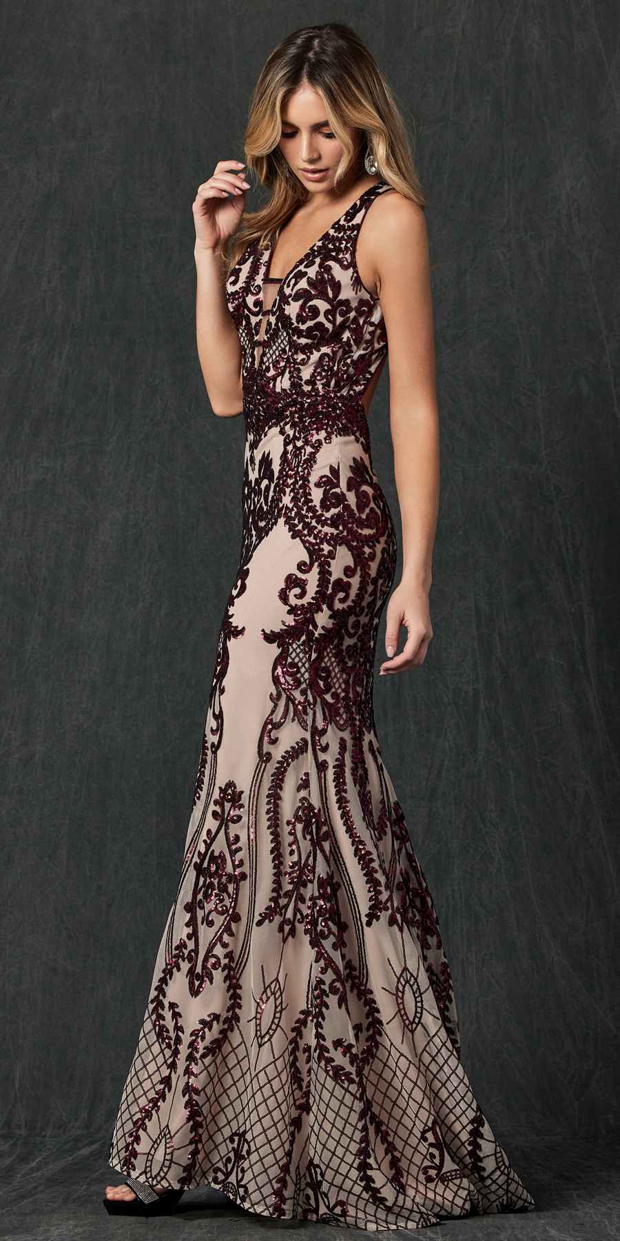 Long sleeveless sequin evening dress in burgundy and nude with ornate front pattern