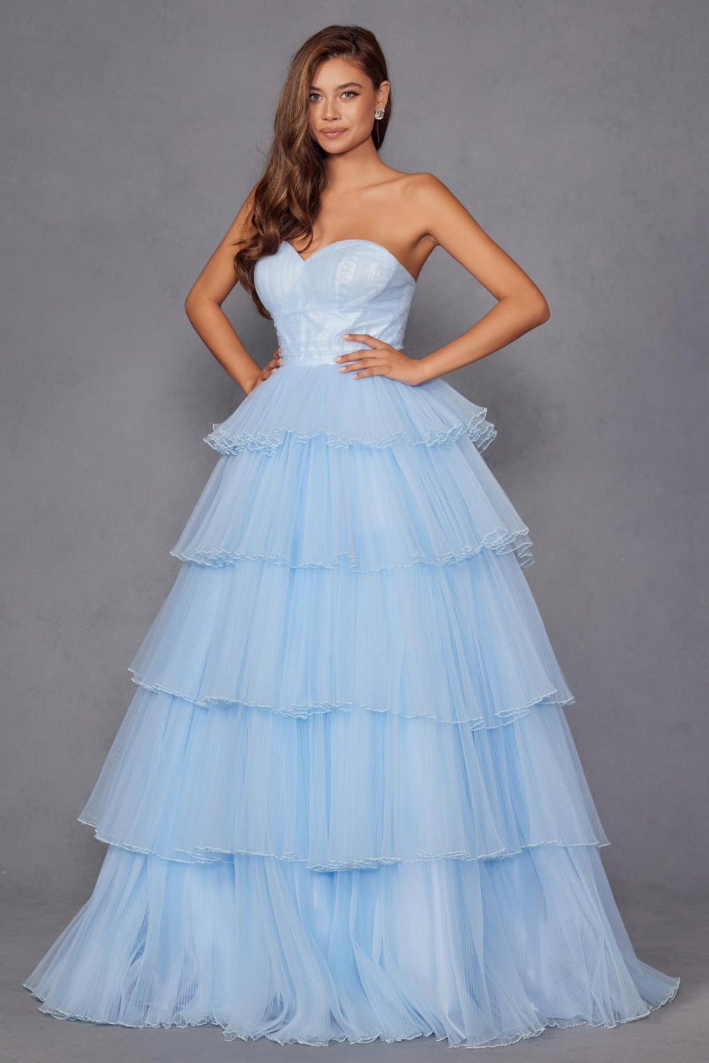 Ice blue strapless A-line gown with tiered ruffle layers and cinched waist