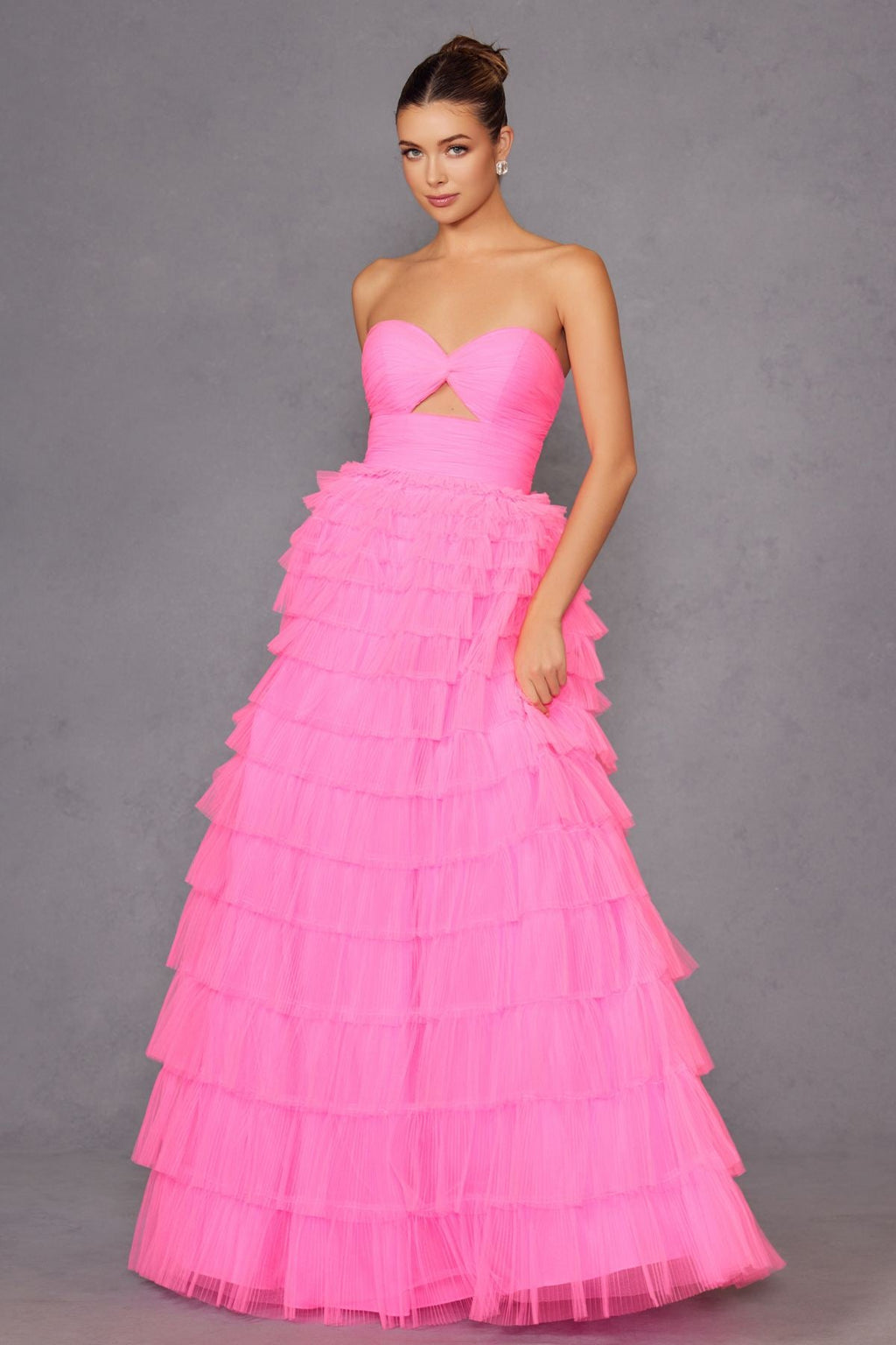 Neon pink strapless tiered ruffle tulle A-line gown with keyhole bodice