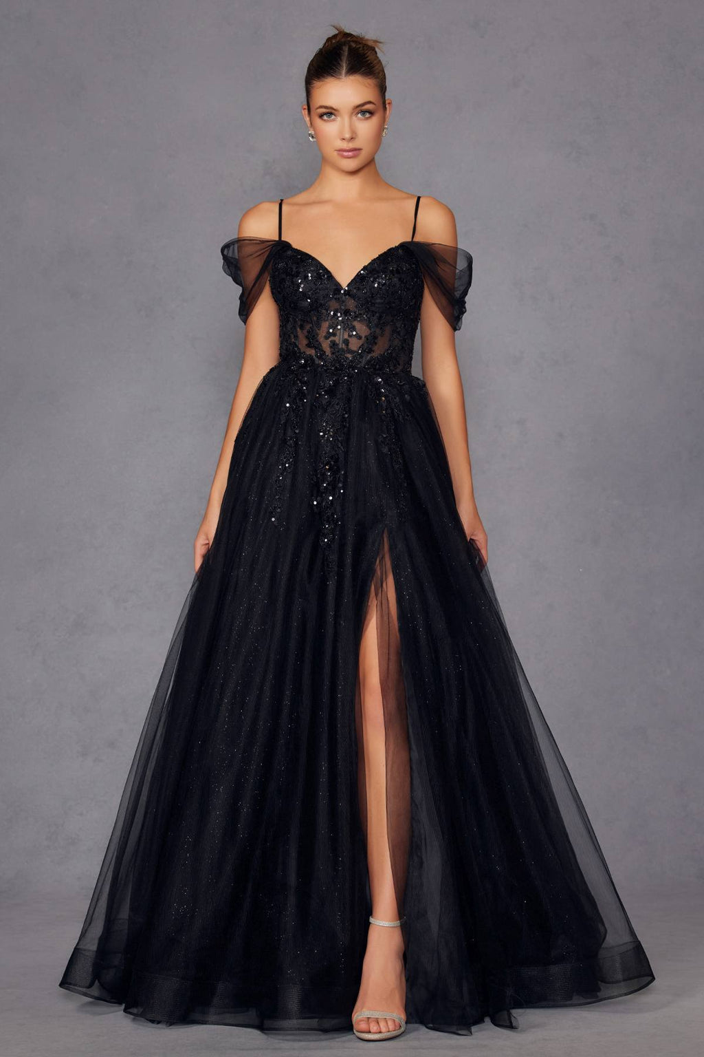 Black sweetheart corset bodice gown with cold-shoulder mesh sleeves, lace detail, and tulle skirt