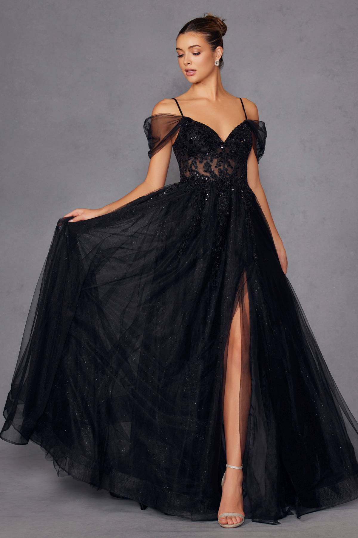 Black sweetheart corset A-line gown with off-shoulder cold-shoulder sleeves and flowing tulle skirt