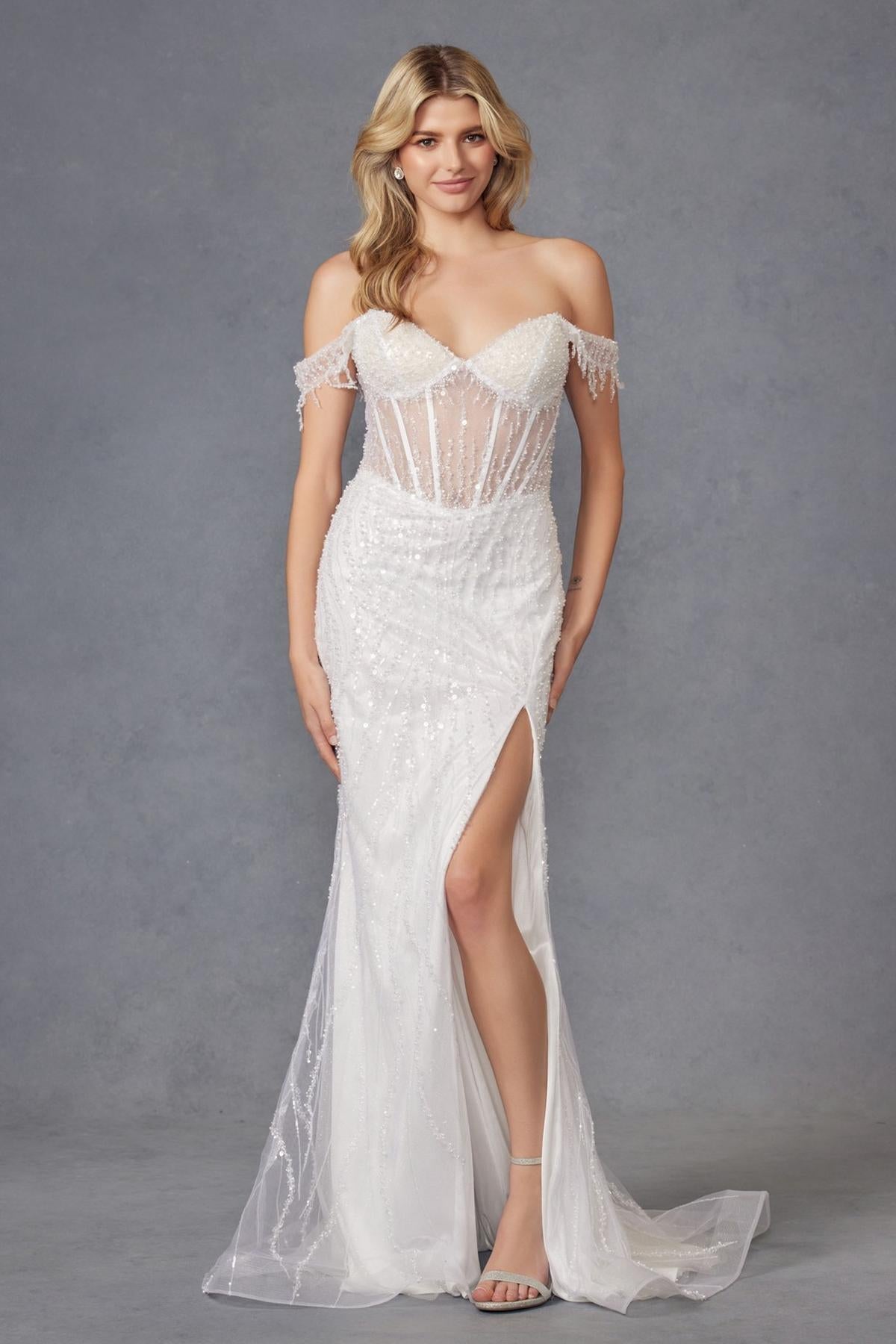Off-white off-shoulder fitted wedding gown with corset bodice, fringe sleeves, and leg slit