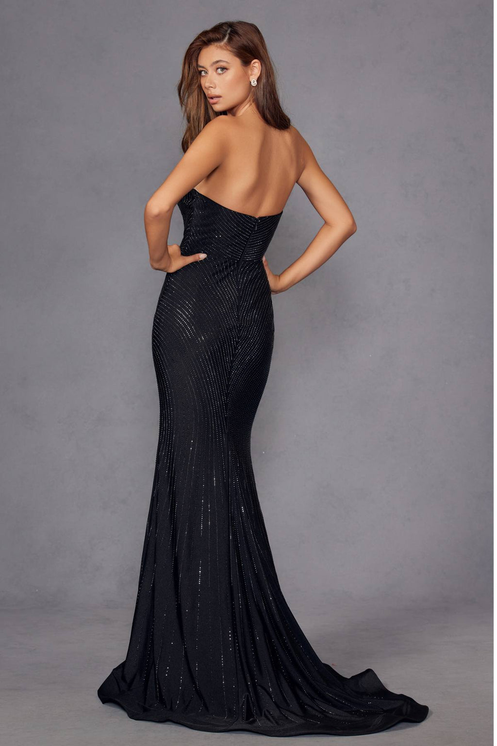 Black strapless sweetheart fitted long gown with rhinestone sparkle, fitted back view