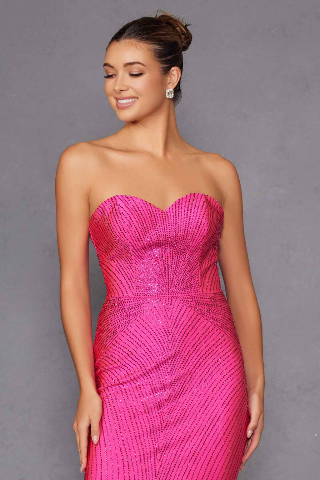 Fuchsia strapless sweetheart rhinestone bodice fitted long gown, close-up