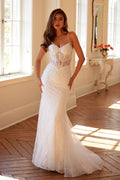 Off-white embellished lace mermaid bridal dress with spaghetti straps and sweetheart neckline.