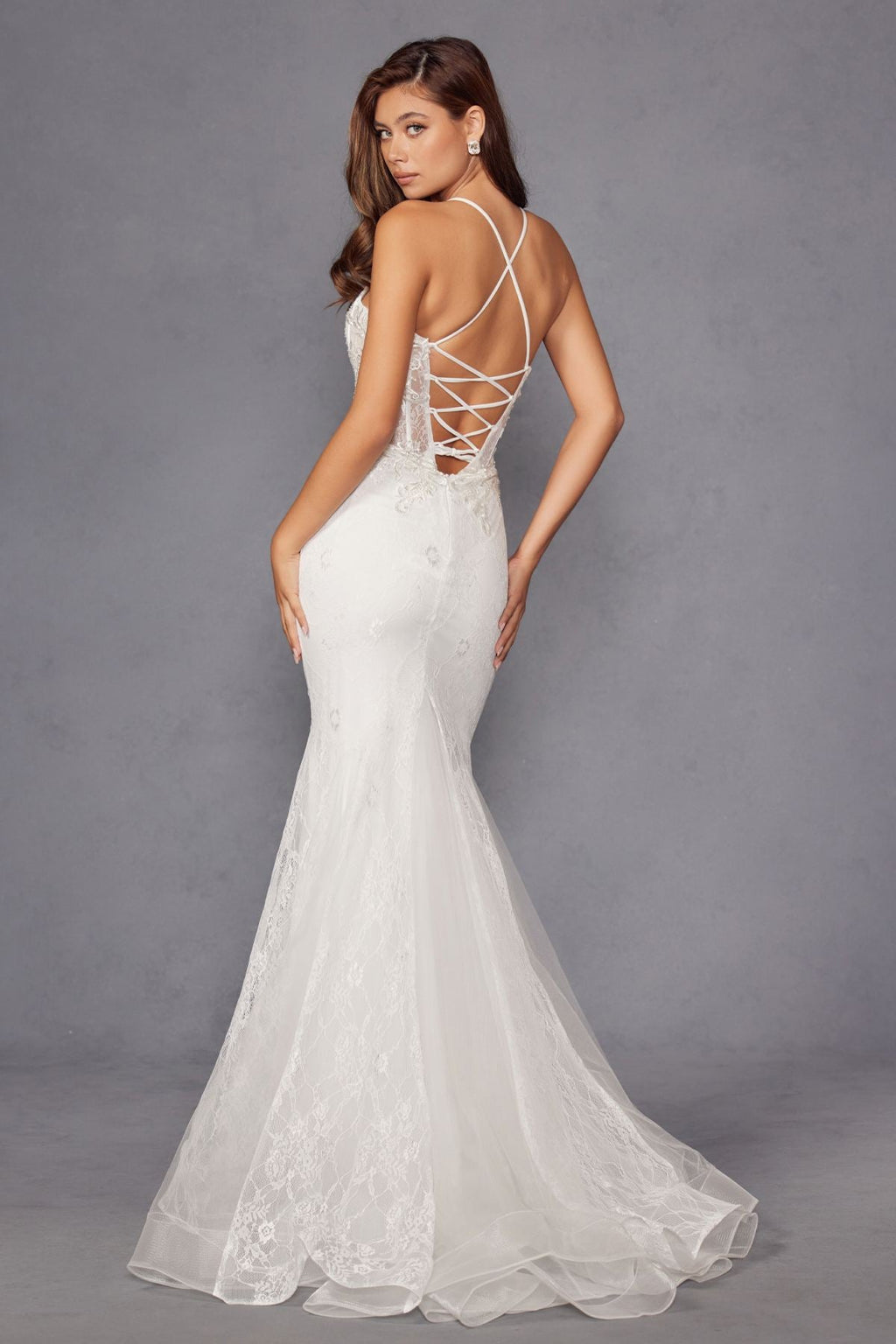Off-white lace mermaid bridal dress with open back crisscross straps and long train