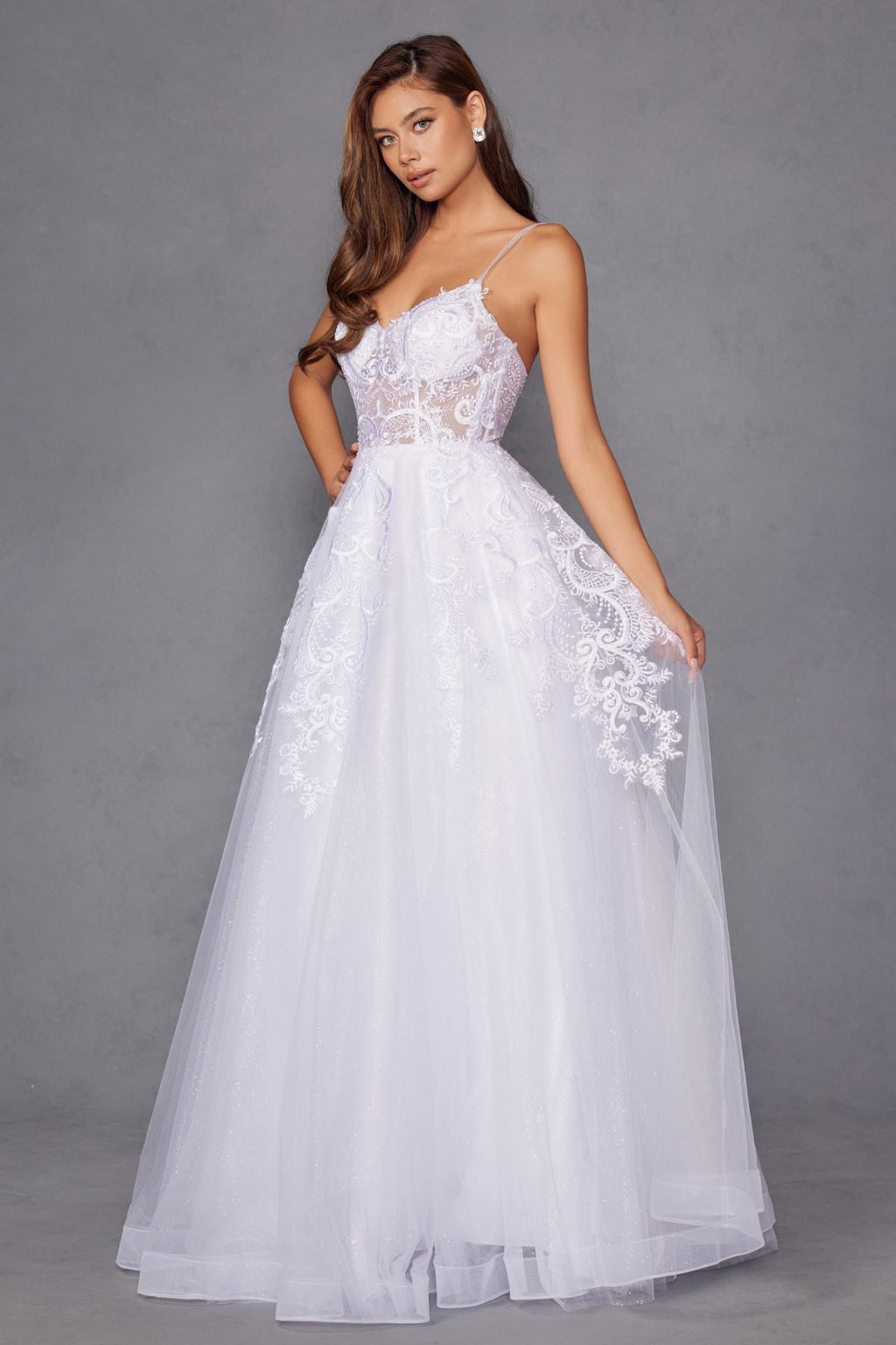 White lace bodice A-line tulle wedding ball gown with spaghetti straps and full skirt
