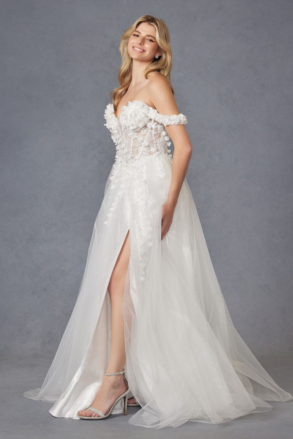 Off-shoulder off-white ball gown with 3D floral lace bodice and layered tulle skirt, front slit