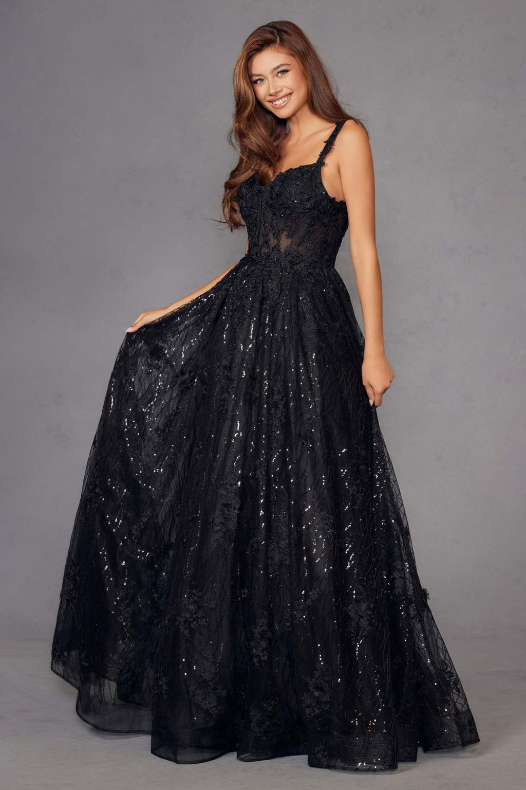 Black A-line floral lace evening gown with corset bodice, spaghetti straps, full skirt