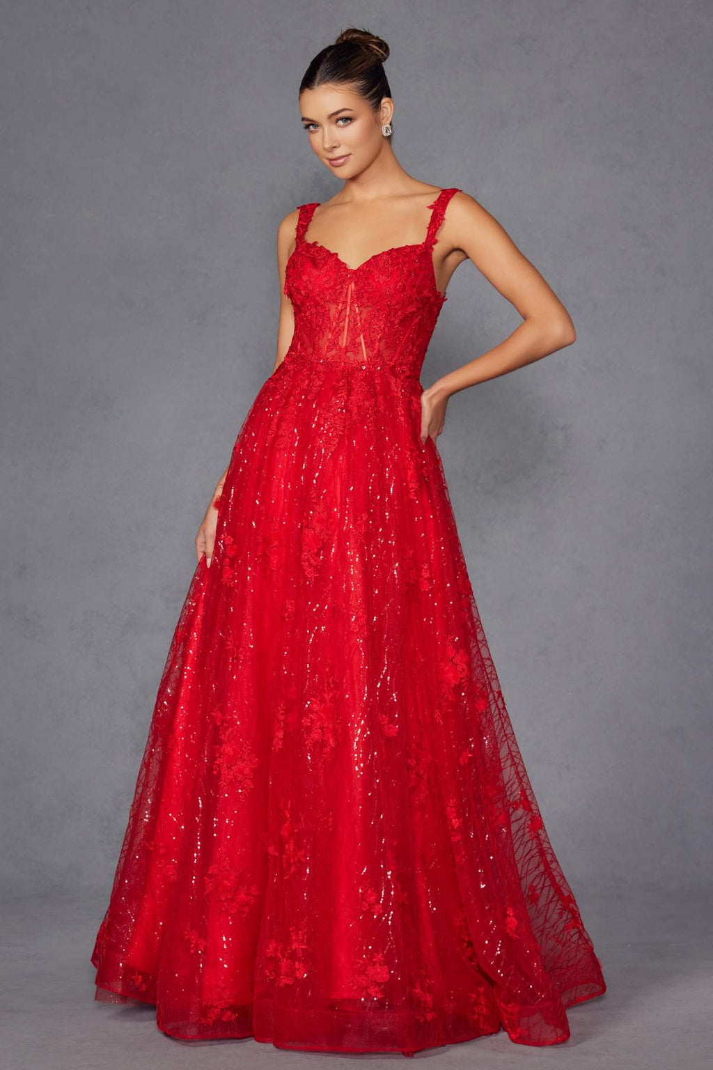 Red A-line evening gown with spaghetti straps and textured sparkle tulle skirt
