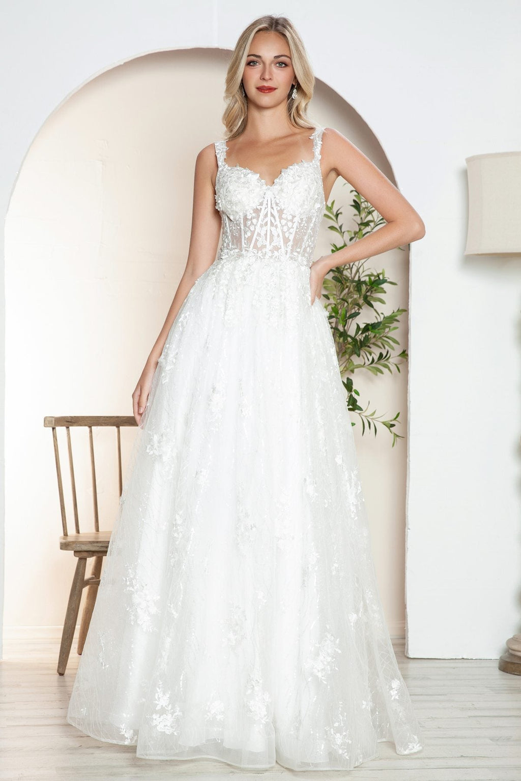 Off-white long A-line lace bridal gown with scalloped V-neckline and fitted waist