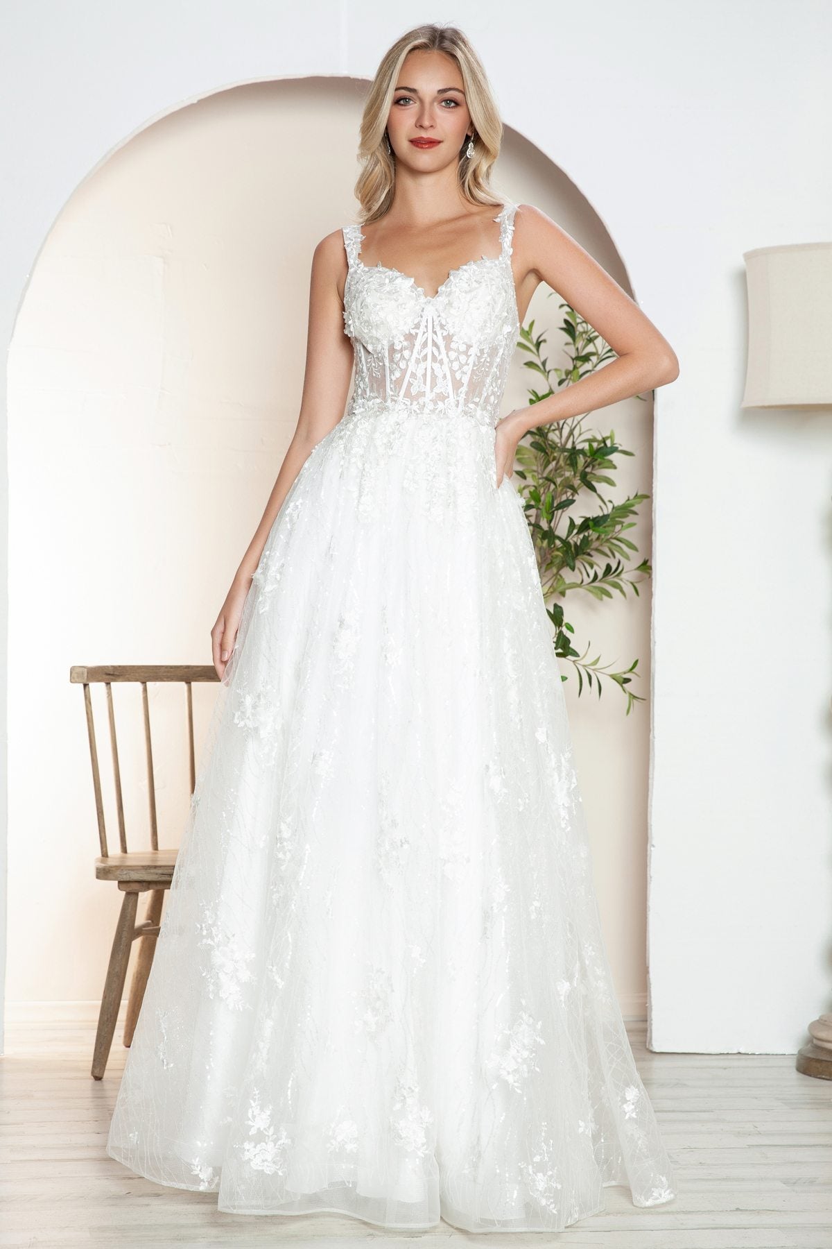 Off-white long A-line lace bridal gown with scalloped V-neckline and fitted waist