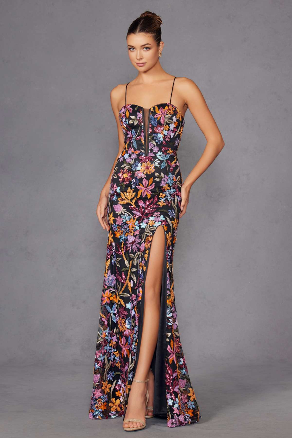 Black floral embroidered evening gown front view with side slit and thin straps