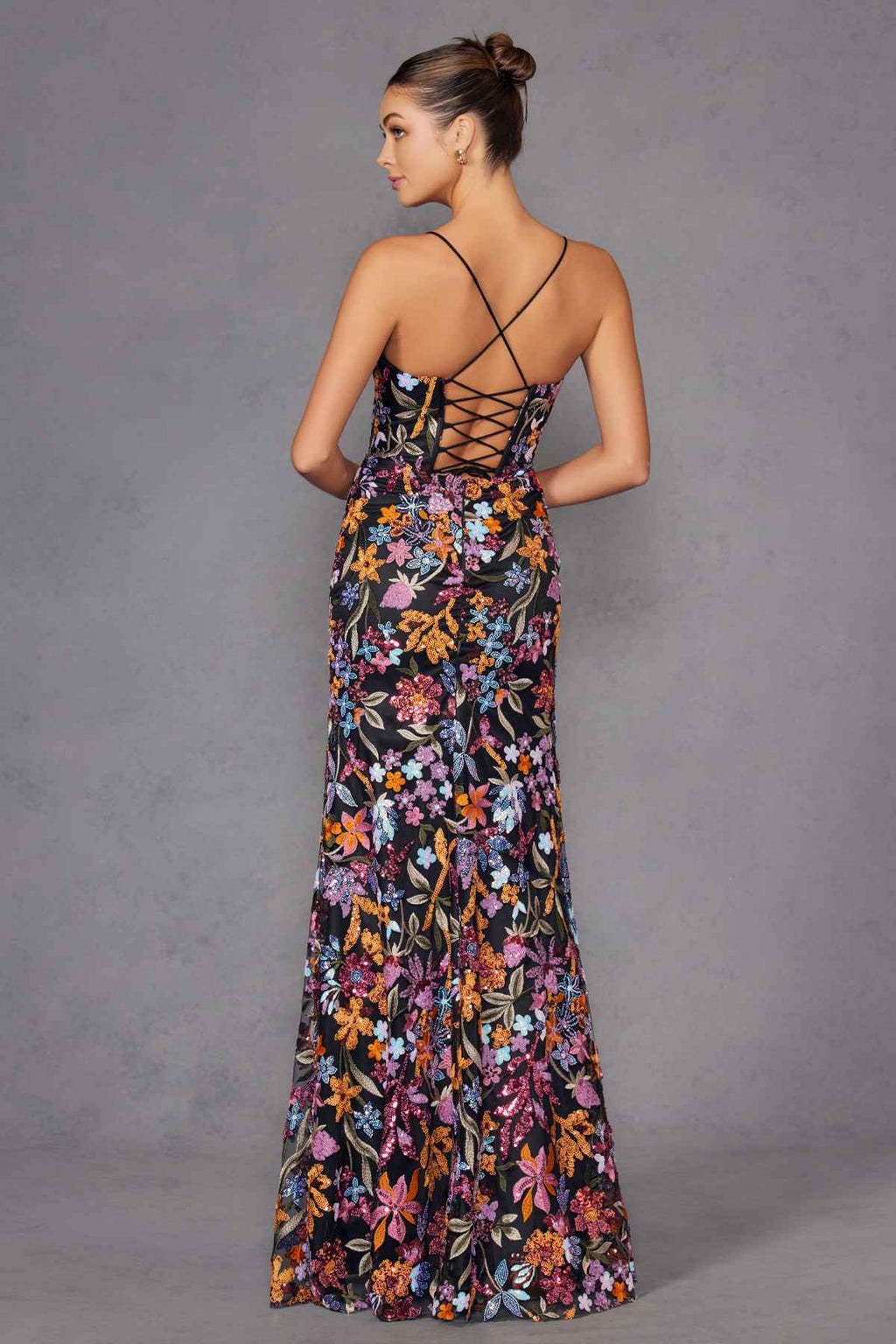 Black floral embroidered evening gown back view with crisscross spaghetti straps