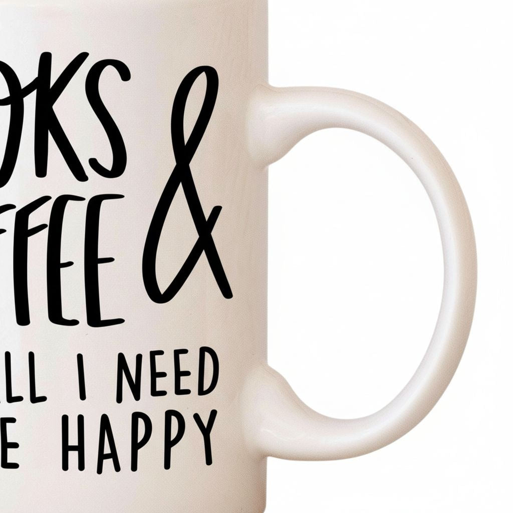 Close-up of white ceramic mug print: 'BOOKS & COFFEE' and 'TO BE HAPPY'