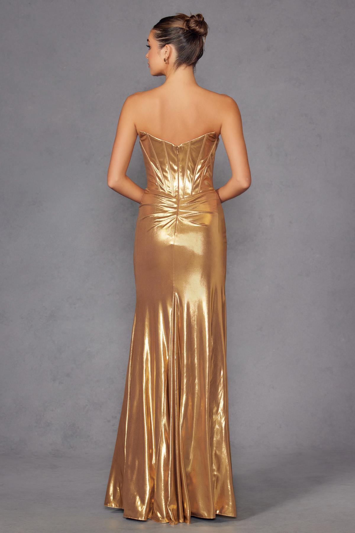 Metallic gold fitted formal gown with corset seams and open back