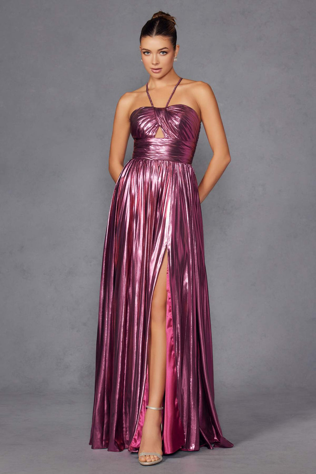 Metallic halter A-line gown in berry with ruched bodice and long pleated skirt