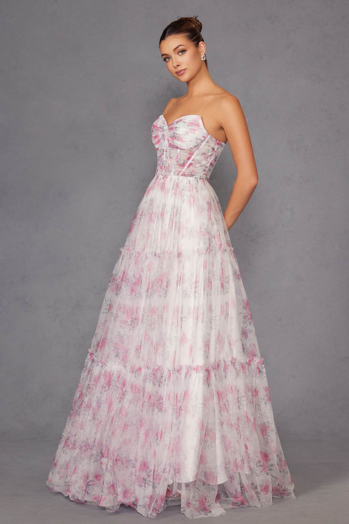 Strapless sweetheart tiered maxi gown with pale pink floral print and cinched waist