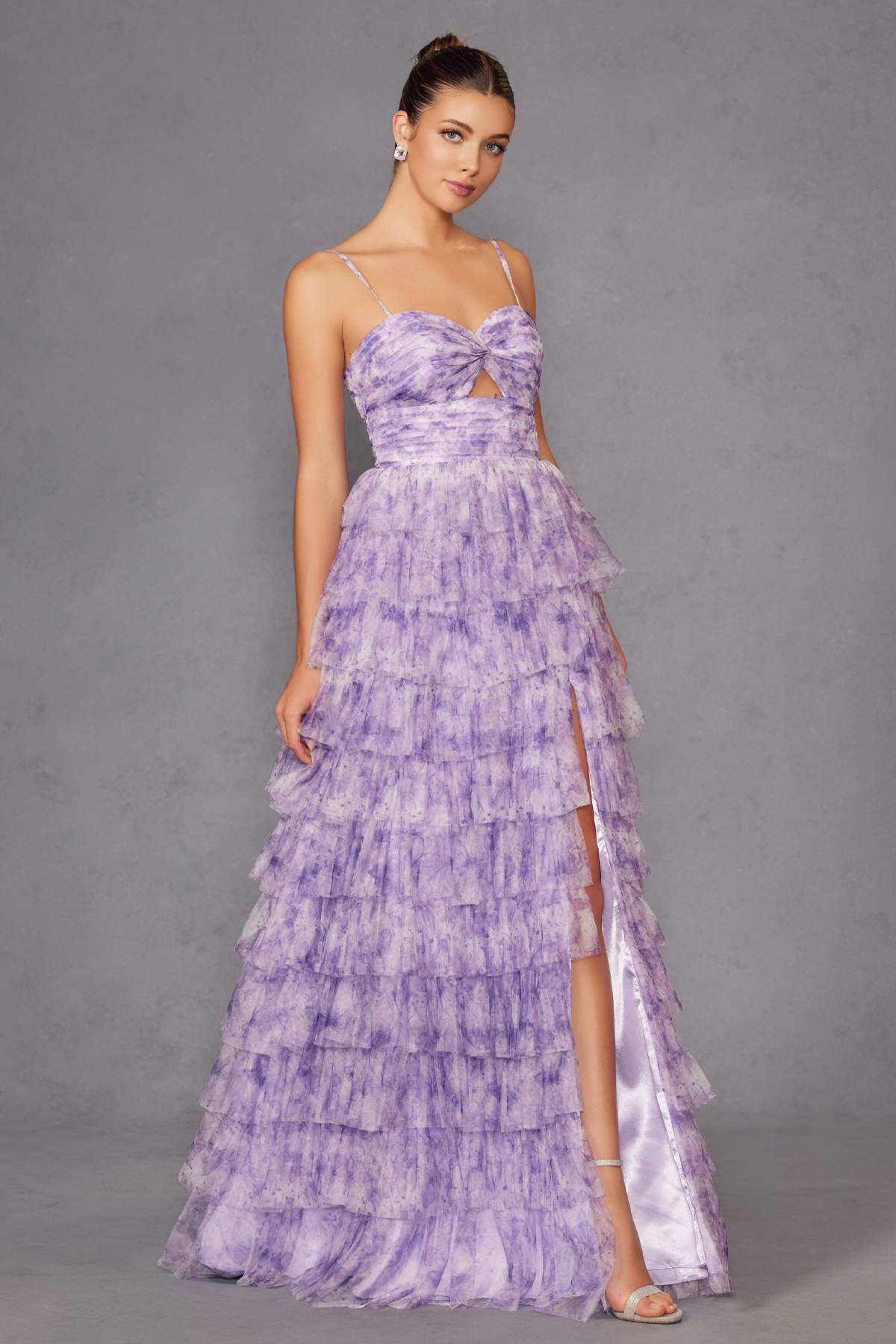 Lilac sweetheart neckline tiered ruffle gown with bow bodice and front slit