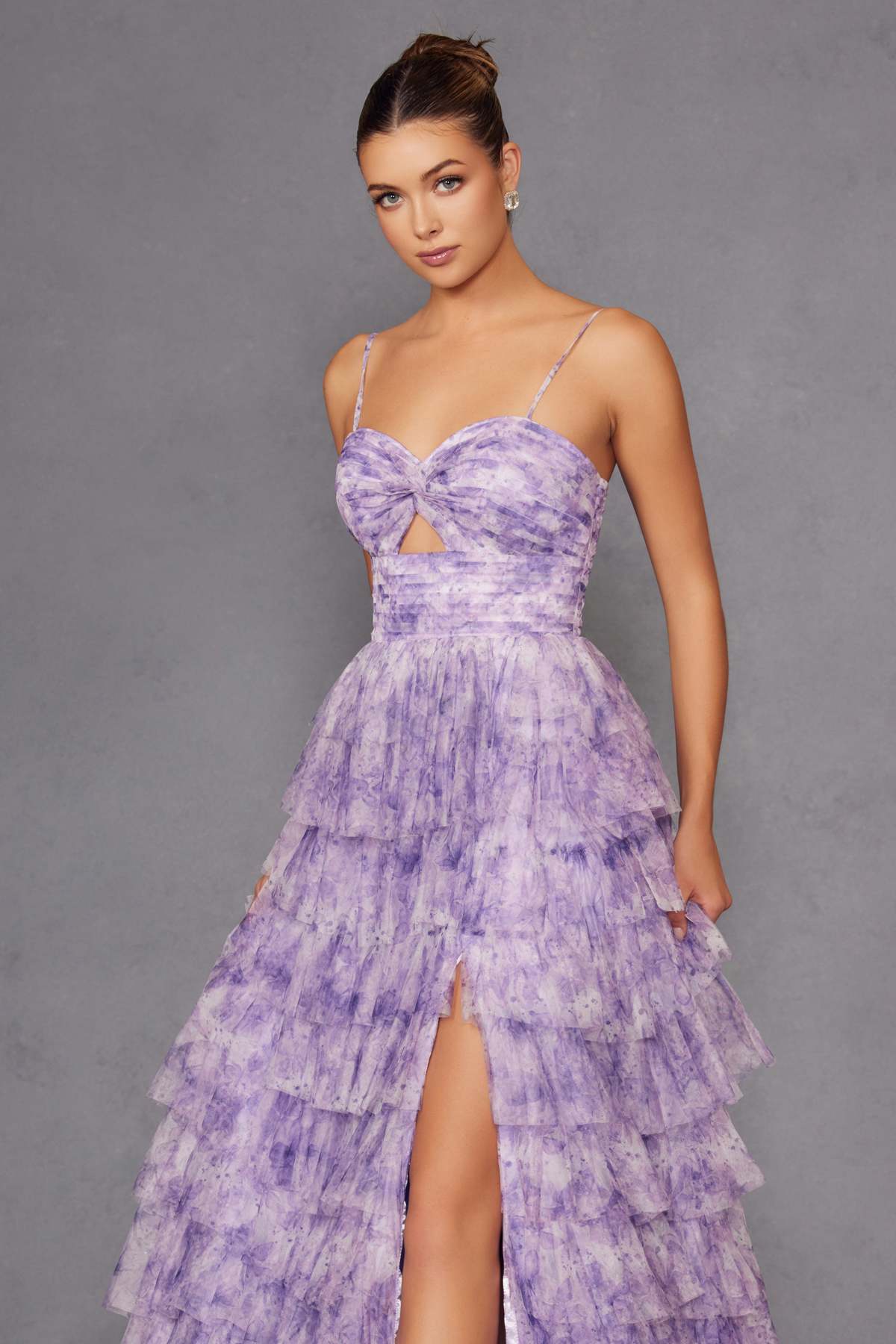 Lilac sweetheart neckline tiered ruffle gown with keyhole bodice and front slit