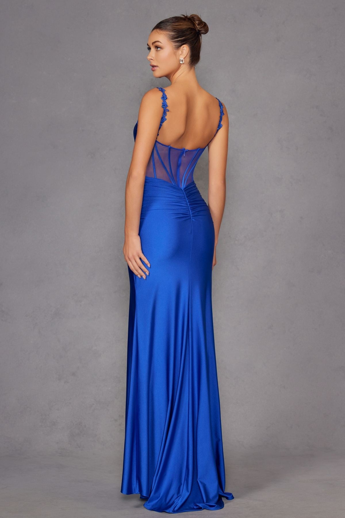 Royal blue fitted evening gown with draped skirt and low back