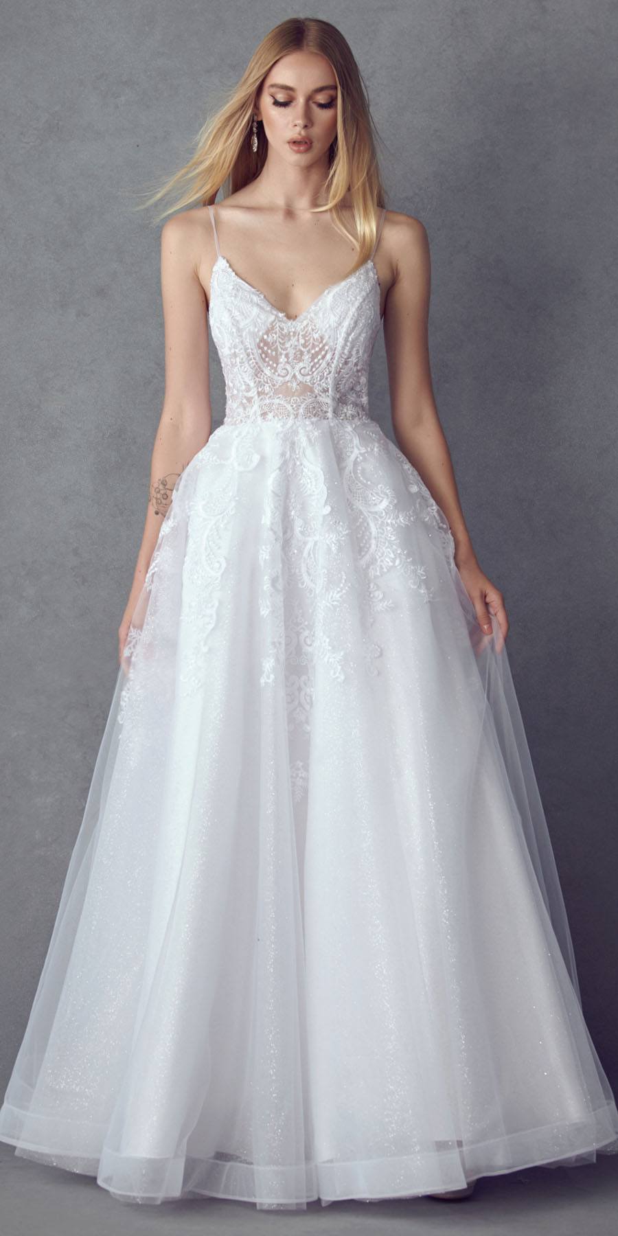 White lace A-line wedding ball gown with spaghetti straps, fitted bodice, tulle skirt