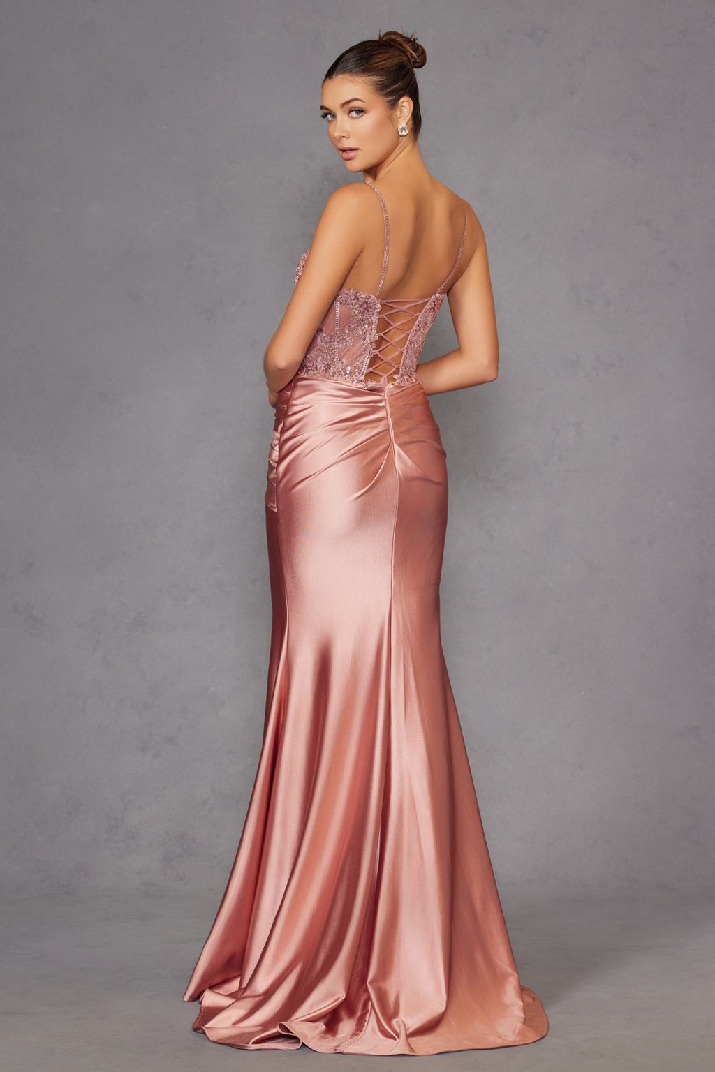 Rose gold satin prom gown with jeweled corset bodice, spaghetti straps, long skirt