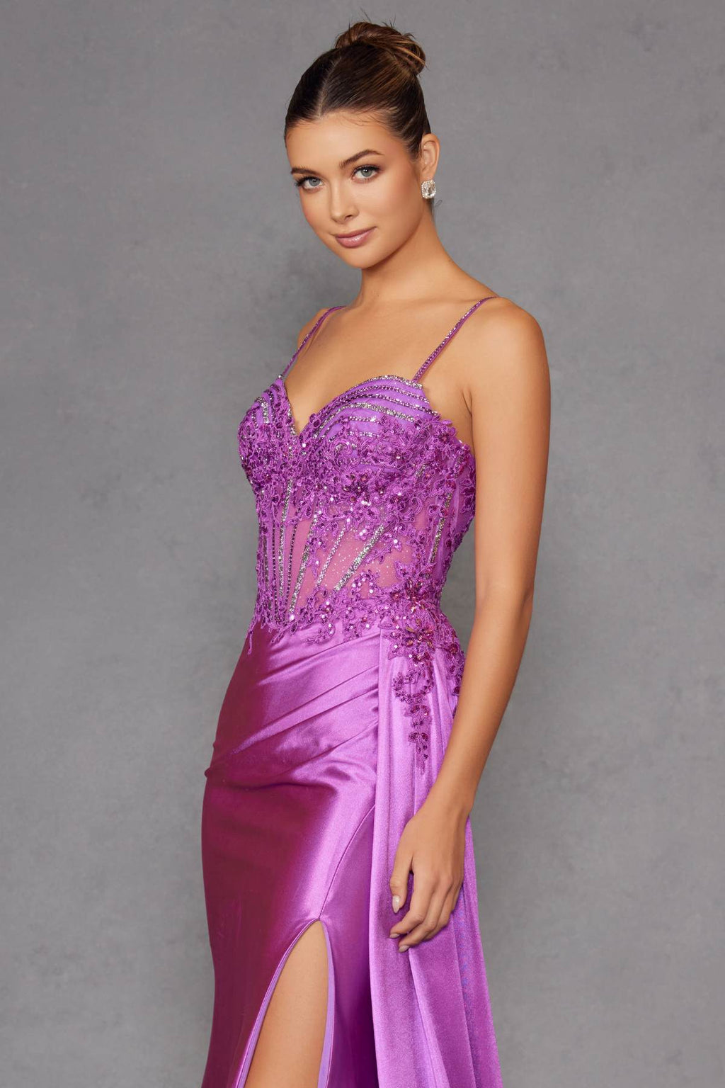 Magenta fitted corset gown with sweetheart neckline, thin straps, and side slit