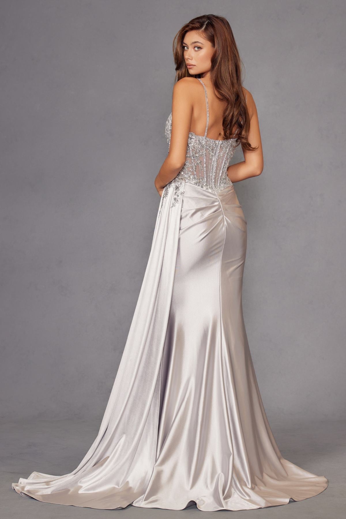 Silver corset gown with sweetheart neckline, fitted bodice, long skirt, side slit