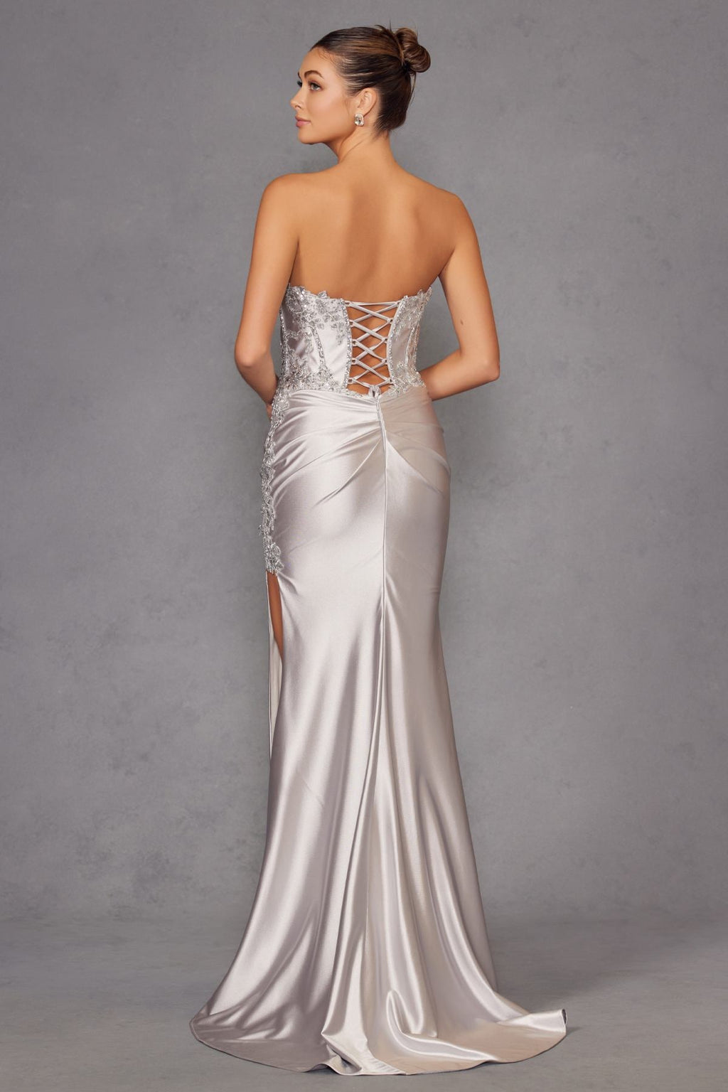 Backless satin prom gown, silver, crisscross corset back and flowing skirt