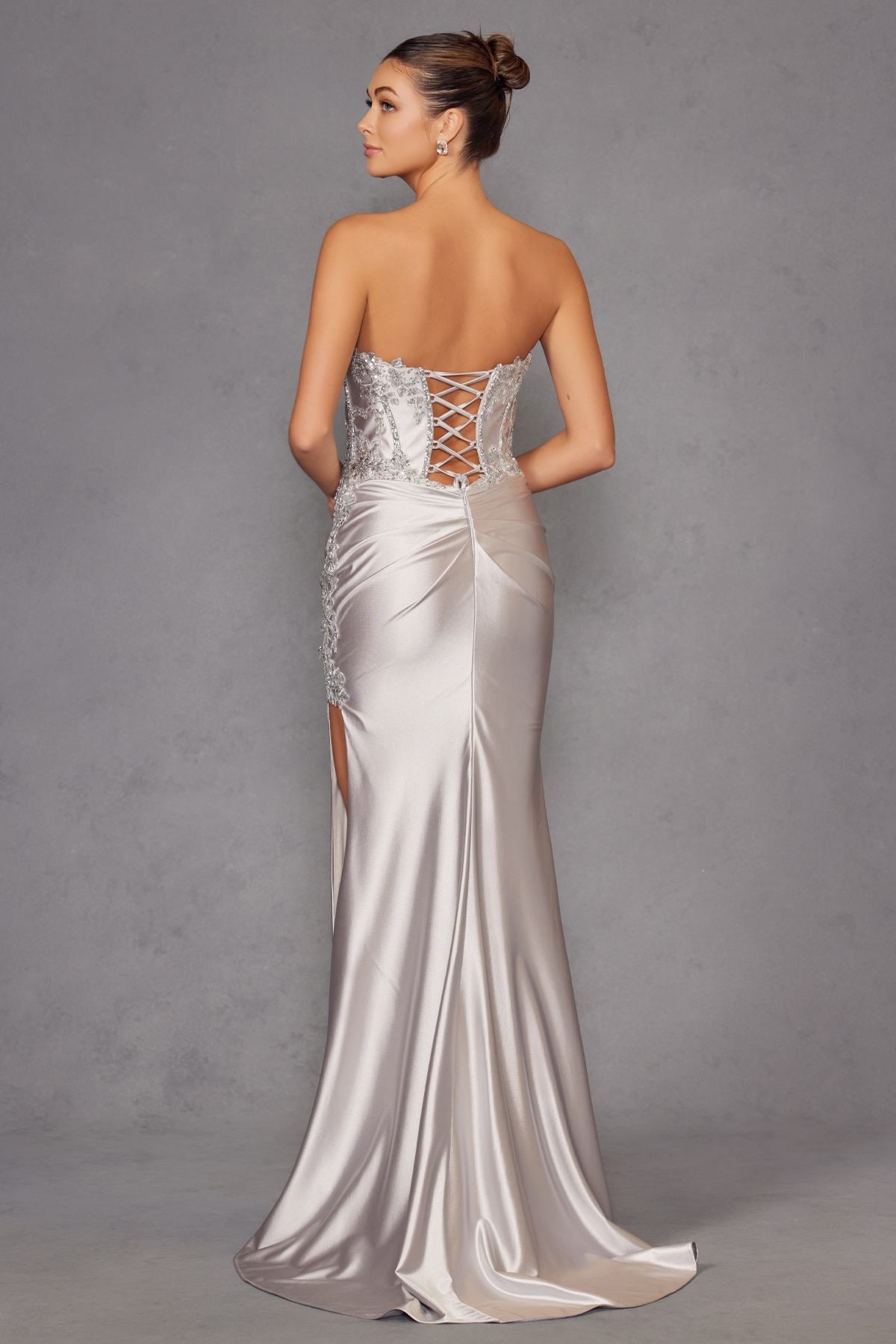 Backless satin prom gown, silver, crisscross corset back and flowing skirt