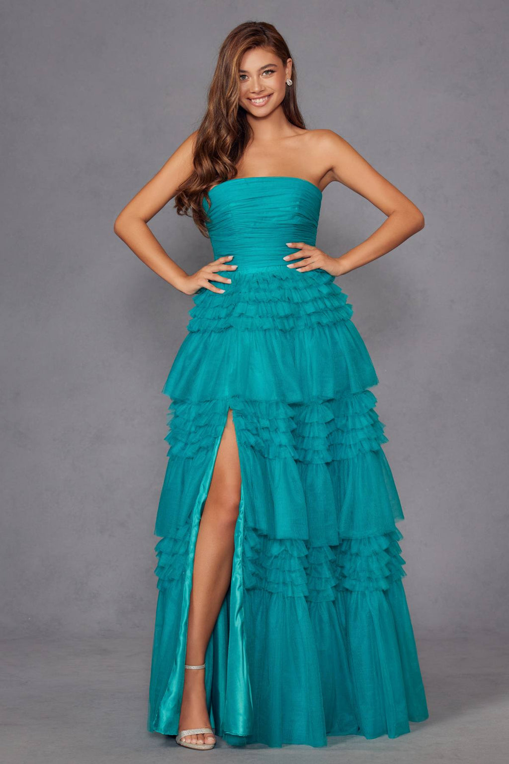 Jade strapless layered tulle A-line gown with tiered ruffle skirt and side slit