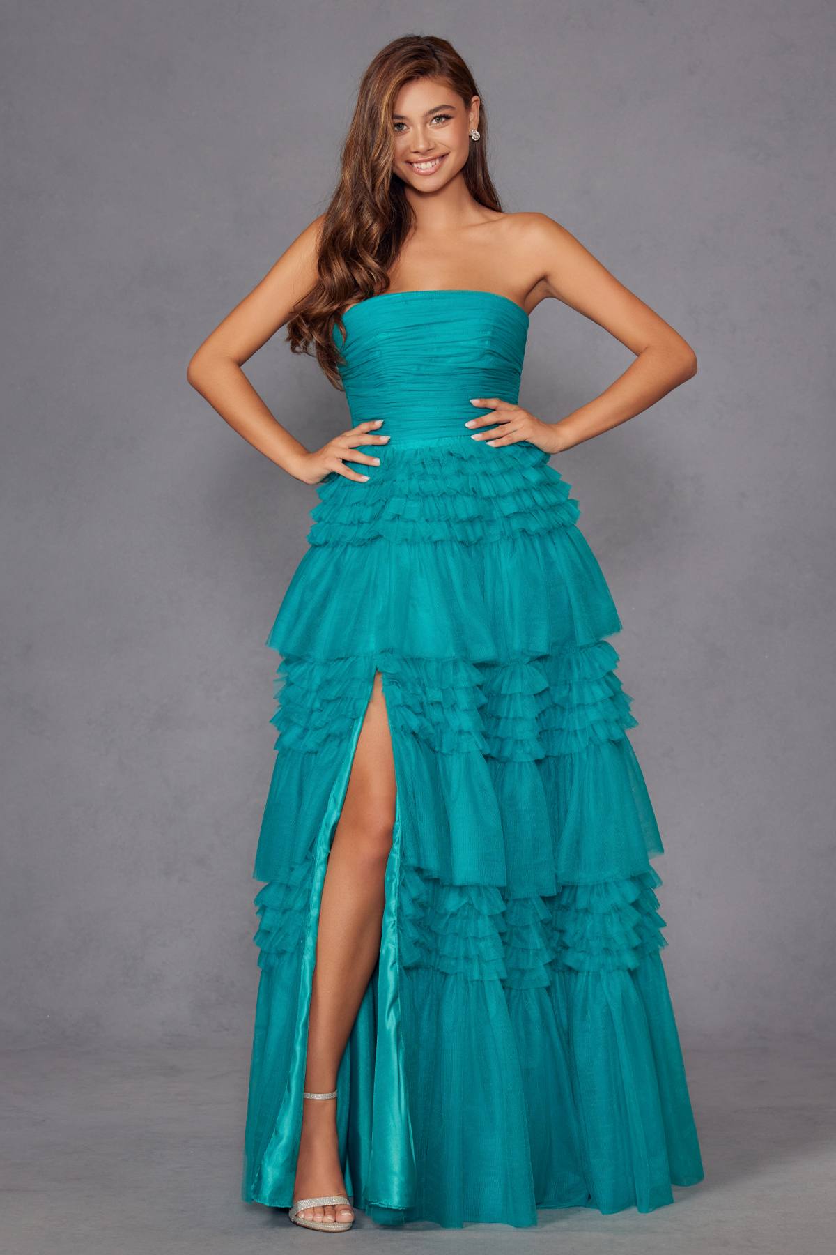 Jade strapless layered tulle A-line gown with tiered ruffle skirt and side slit