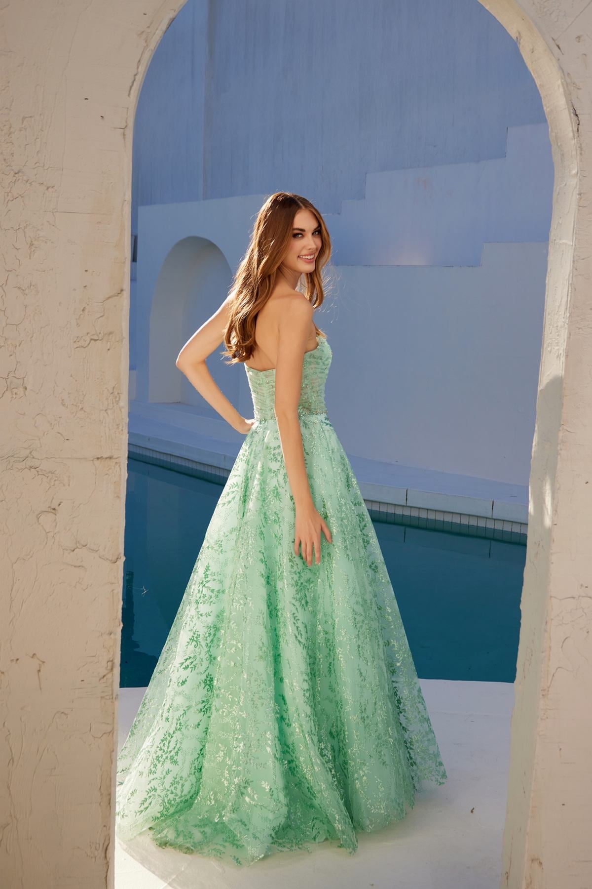 Mint green strapless sweetheart A-line gown, textured lace flare