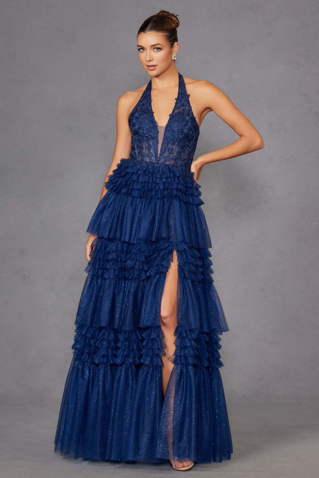 Navy blue halter V-neck layered tulle A-line gown with front slit and ruffles