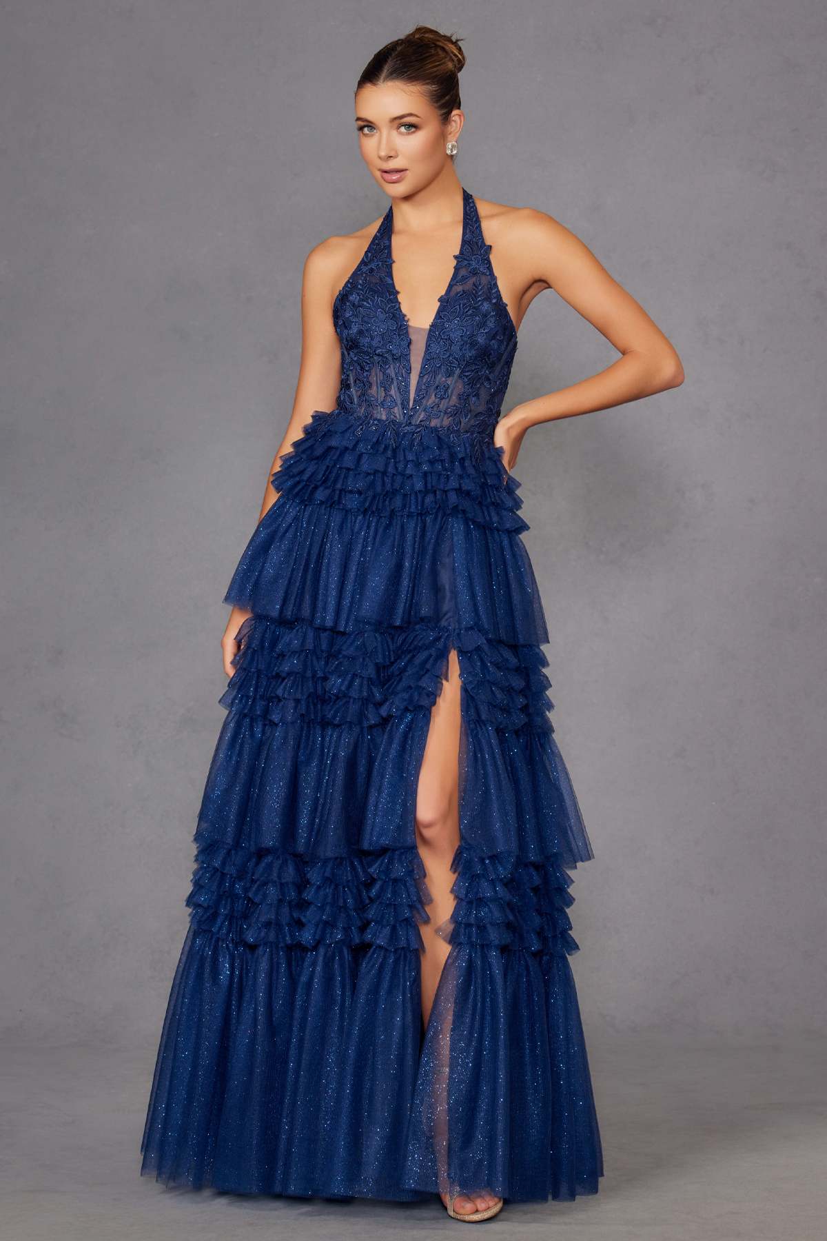 Navy blue halter V-neck layered tulle A-line gown with front slit and ruffles
