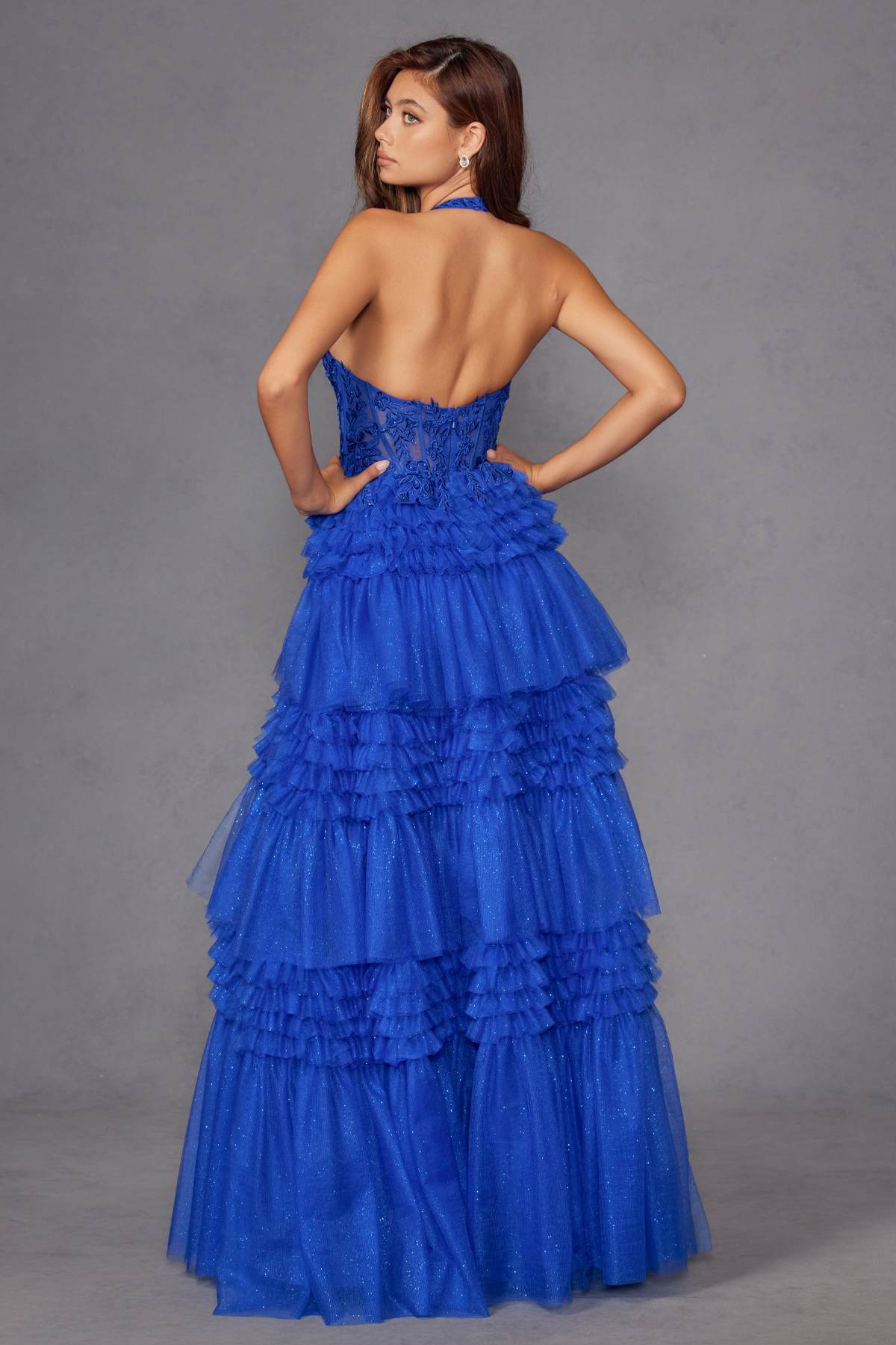 Royal blue halter V-back tiered tulle A-line gown with layered ruffle skirt