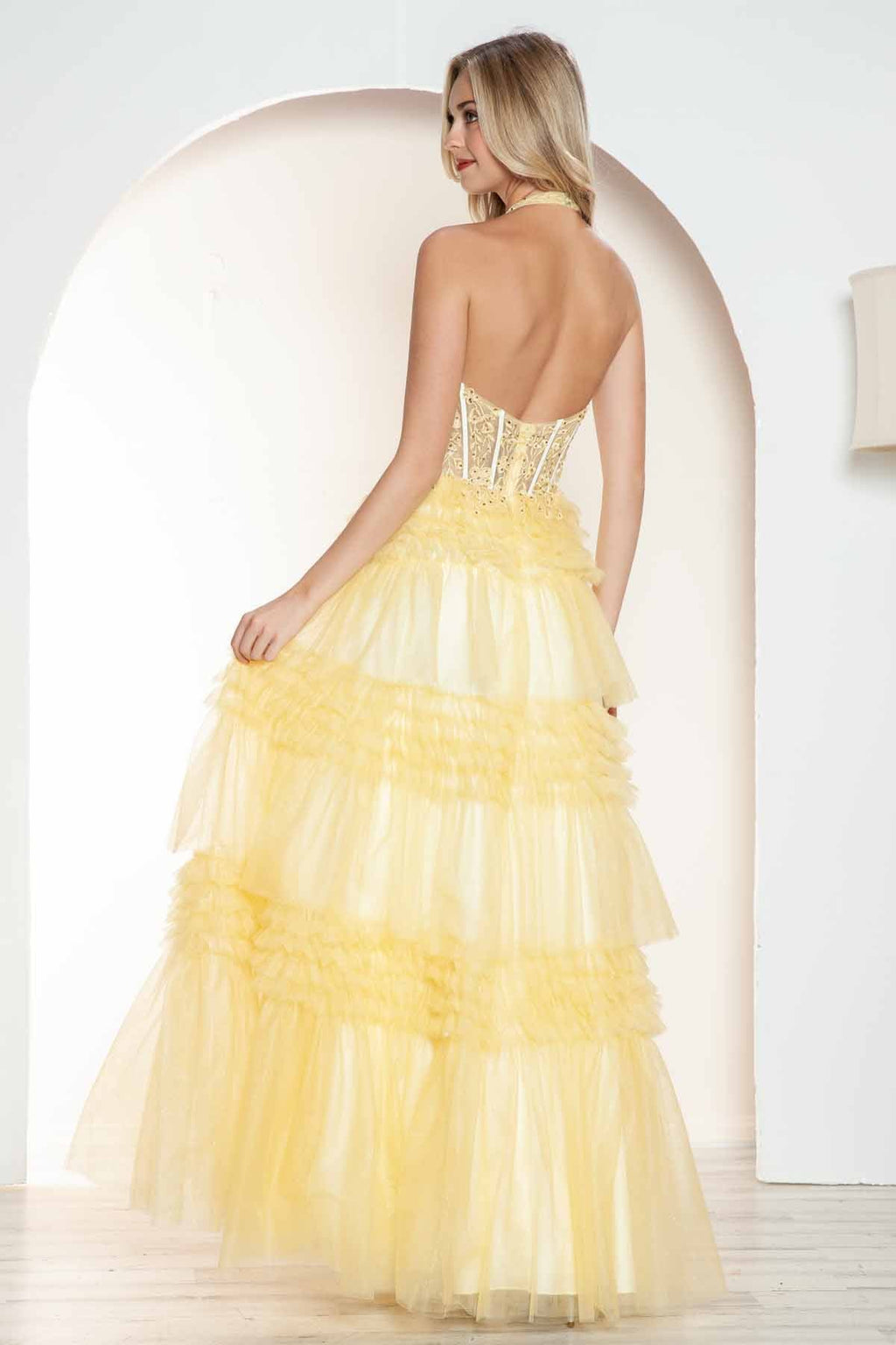 Yellow halter V-back layered tulle A-line gown with tiered ruffle skirt